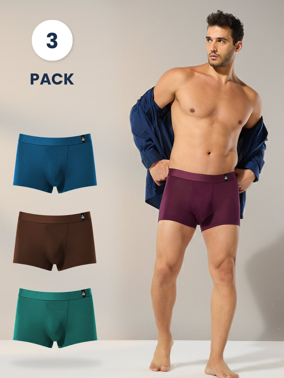 Man wearing purple underwear with three additional pairs displayed, including blue, brown, and green.