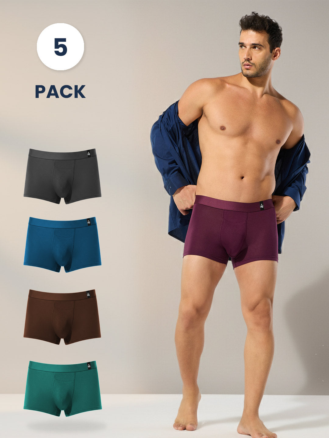 Man wearing purple underwear with four additional pairs displayed, including blue, brown, dark grey, and green.