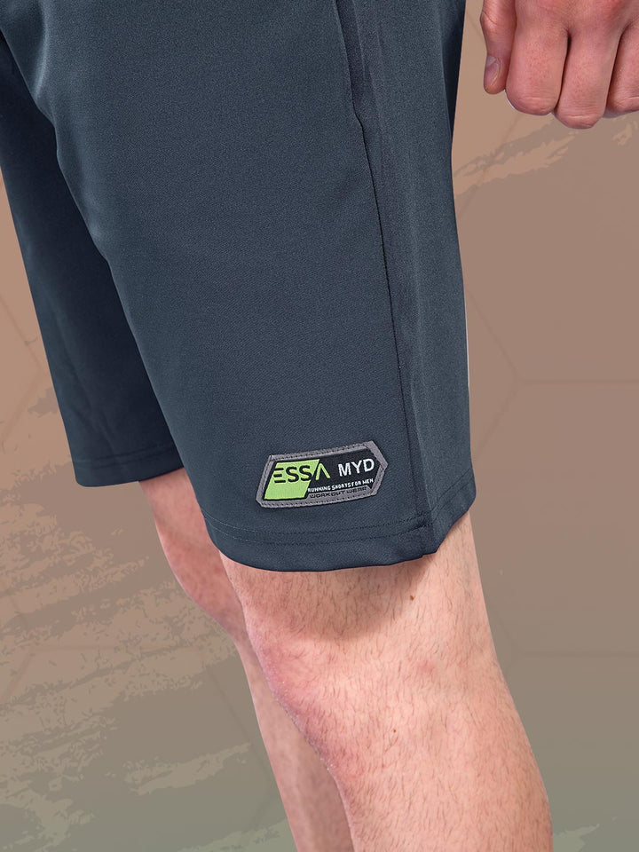 Navy shorts with a brand logo on a beige background