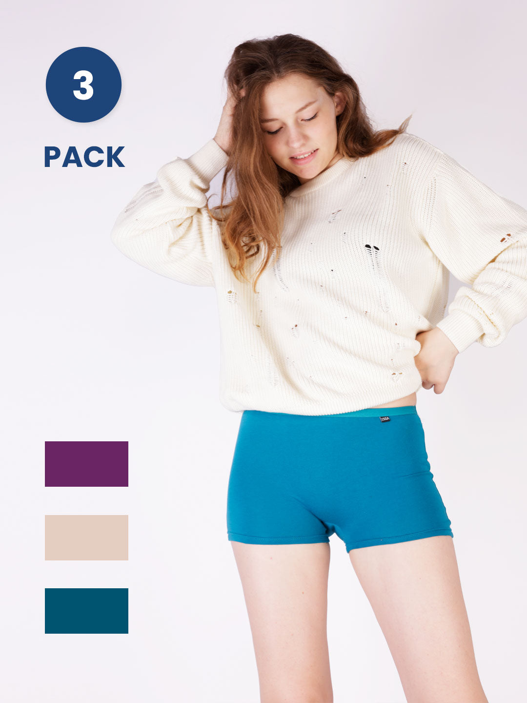 Woman wearing teal underwear with color swatches below on a white background