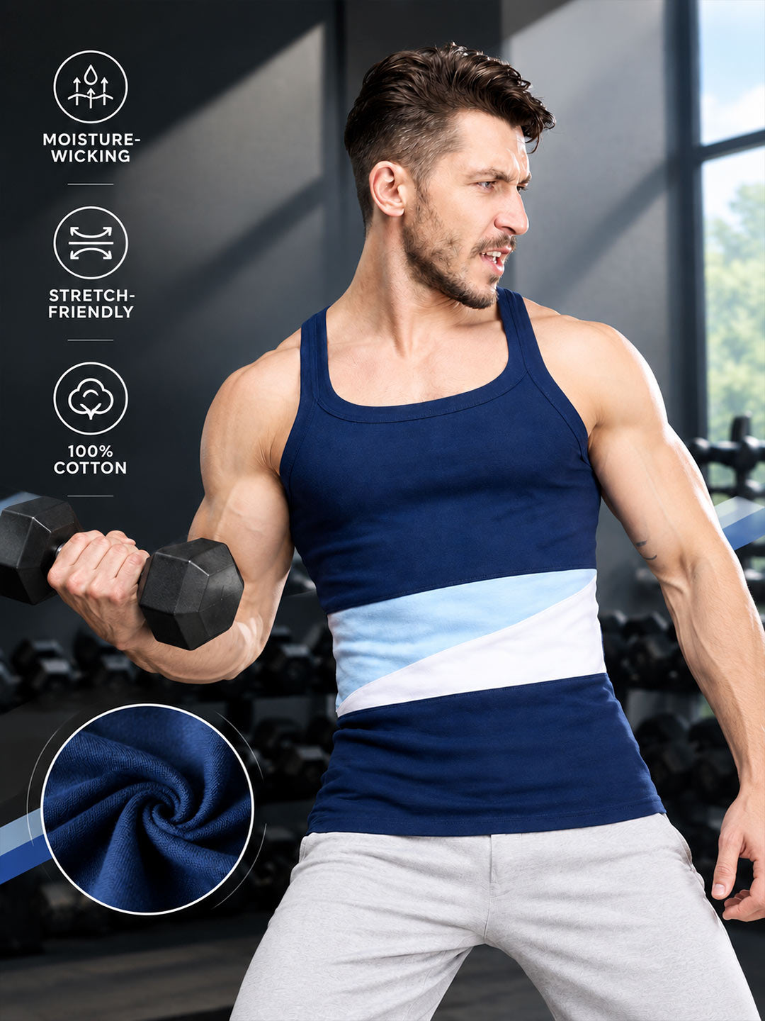 A man in a gym wearing a navy blue tank top with a light blue and white diagonal stripe across the chest, lifting a dumbbell. The image includes feature callouts on the left: 'MOISTURE-WICKING', 'STRETCH-FRIENDLY', and '100% COTTON', plus a fabric swatch inset at the bottom left.#color_cloud-burst