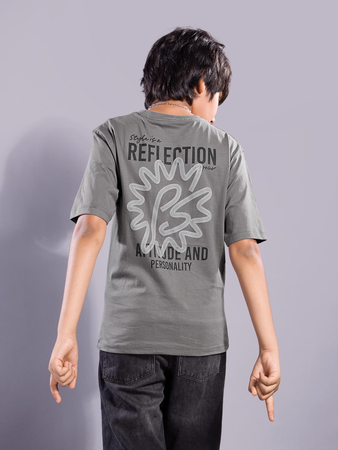 Person wearing a gray t-shirt with text and graphics on the back against a plain background boys printed down shoulder t-shirt #color_dove-grey