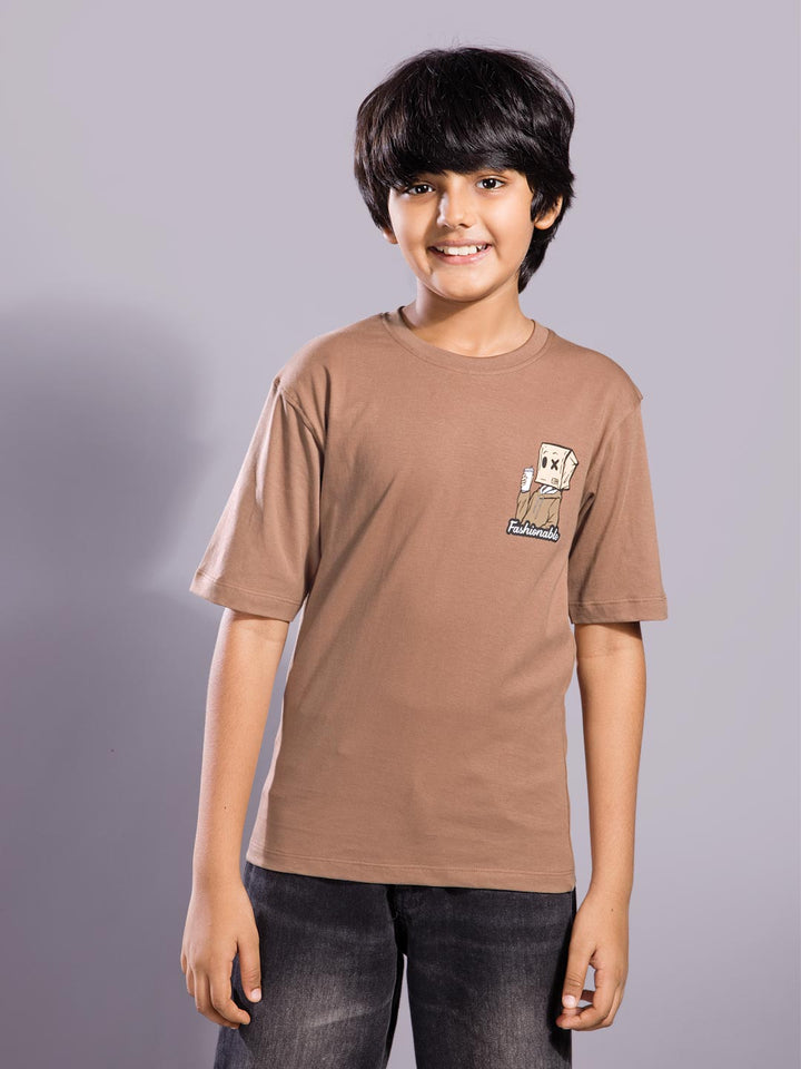 Child wearing a brown t-shirt with a logo on a gray background boys printed down shoulder t-shirt 