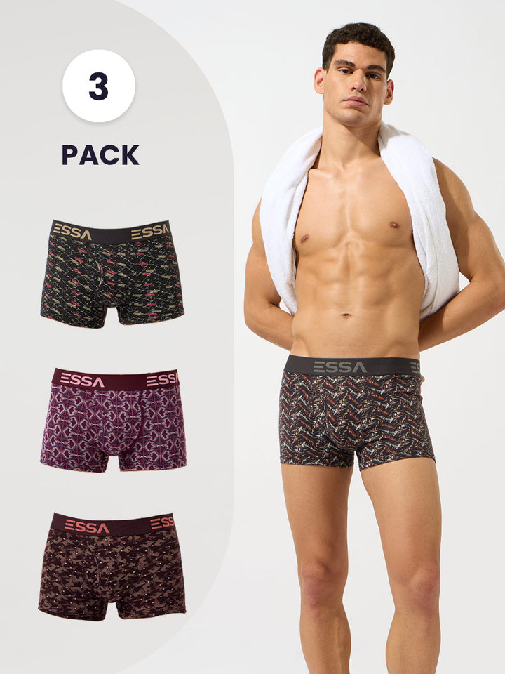 Man wearingESSA brand boxer briefs with three-pack display on the left.