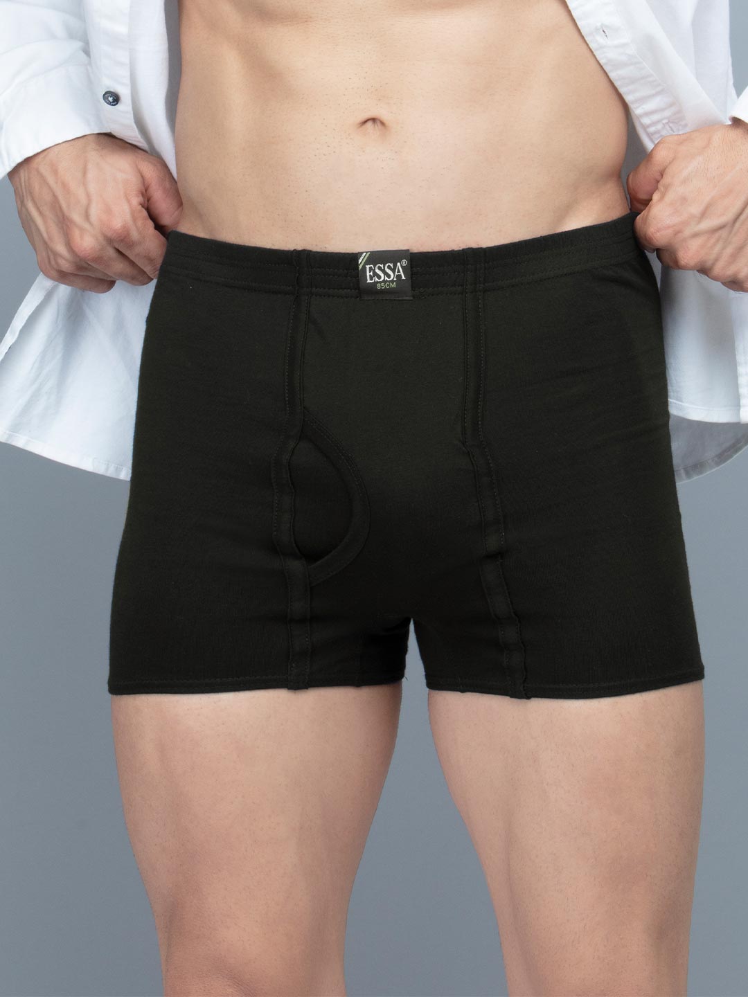 Person wearing black boxer briefs with a white shirt on a gray backgroundtrend plain black color trunk for men-essa garments#color_heavy-metal